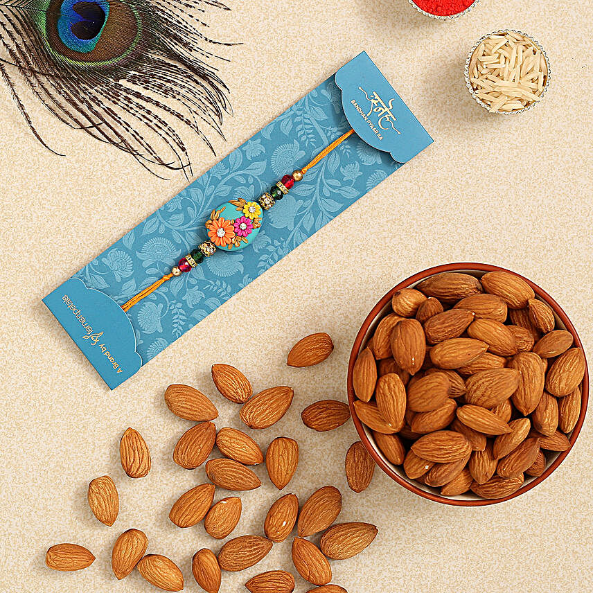Blue Oval Floral Kids Rakhi And Healthy Almonds
