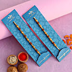 Traditional Pearl Studded Rakhis Set Of 2 With 100 Gms Almonds