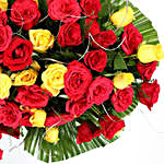 100 Red & Yellow Roses Premium Arrangement