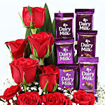 Red Roses & Dairy Milk Arrangement In Round FNP Box