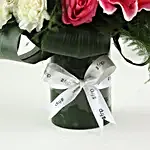 Elegant Mixed Flowers In Cylindrical Vase