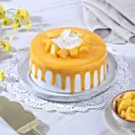 Dripping Mango Cream Cake Eggless