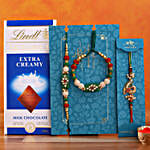 /images/pr/australia/l/v20210716135400/green-pearl-and-peacock-lumba-rakhi-set-with-lindt_1.jpg