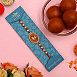 /images/pr/austria/l/v20210716102830/auspicious-om-pearl-rakhi-and-gulab-jamun_1.jpg