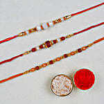 Divine Pearl Thread Rakhis Set Of 3