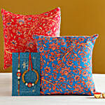 Orange Lumba Rakhi Set And 2 Floral Print Cushions