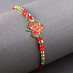 /images/pr/canada/l/v20220630200057/sneh-exclusive-om-leaf-rakhi_3.jpg