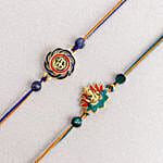 /images/pr/canada/l/v20240704142926/vibrant-ganesh-and-om-rakhi-duo-n-milk-cake-delight_2.jpg