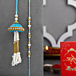 /images/pr/canada/l/v20240705142537/tranquil-teal-jhumar-lumba-pearl-rakhi-set-n-ferrero-indulgence_2.jpg