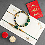 /images/pr/canada/l/v20240711124426/enchanted-stone-work-lumba-pearl-rakhi-set-with-dodha-barfi-combo_2.jpg