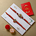 /images/pr/denmark/l/v20240711125202/om-namah-shivay-rakhi-duo-n-almond-delight_5.jpg