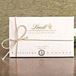 /images/pr/germany/l/v20210728143801/designer-pearl-rakhi-and-lindt-pralines_3.jpg