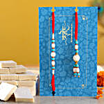 /images/pr/germany/l/v20220614172243/blue-pearl-and-lumba-rakhi-set-with-340-gms-kaju-katli_1.jpg