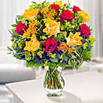 /images/pr/germany/l/v20221123111408/absolute-harmony-red-n-orange-roses-with-free-vase_1.jpg