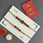 /images/pr/hungary/l/v20240711131445/serene-spirit-rudraksha-rakhi-n-chocolate-bomb-combo_3.jpg