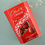 /images/pr/hungary/l/v20240711131445/serene-spirit-rudraksha-rakhi-n-chocolate-bomb-combo_4.jpg