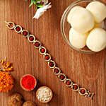 /images/pr/ireland/l/v20210716130129/rudraksha-bracelet-style-rakhi-and-rasgulla_1.jpg