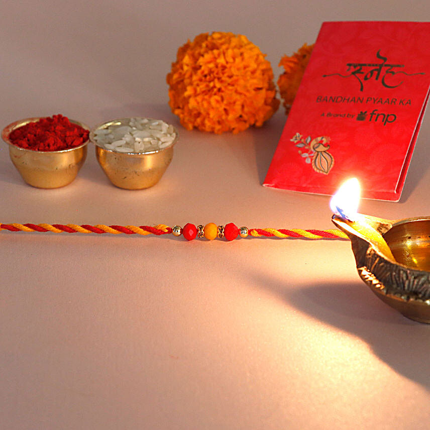/images/pr/l/v20240618180412/mauli-harmony-rakhi_1.jpg