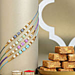 /images/pr/malaysia/l/v20240711133525/zen-beadwork-rakhi-set-with-channa-barfi-combo_1.jpg