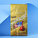 /images/pr/new-zealand/l/v20240710181345/blessings-of-rudraksha-rakhi-n-lindt-lindor-pack_4.jpg