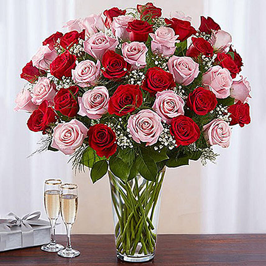 /images/pr/qatar/l/v20201214191522/50-vivid-red-and-pink-roses-in-vase_1.jpg