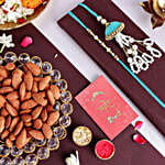 /images/pr/qatar/l/v20240726111056/tranquil-teal-jhumar-bhaiya-bhabhi-pearl-rakhi-set-n-nutty-duo_1.jpg