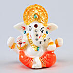/images/pr/l/v20211013121418/sansevieria-plant-with-ganesha-idol-and-chocolates_2.jpg
