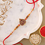 /images/pr/l/v20220603175242/sneh-auspicious-om-rakhi_1.jpg