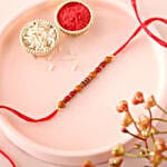 /images/pr/l/v20220603175305/sneh-stunning-crisp-pearl-rakhi_1.jpg