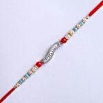 /images/pr/l/v20220705185523/sneh-diamond-studded-pearl-rakhi_3.jpg