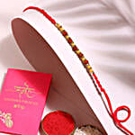 /images/pr/l/v20230630153006/sneh-holy-rudraksha-rakhi-n-lindt-chocolates_2.jpg