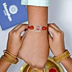 /images/pr/l/v20230804114508/sneh-silver-shivaling-rakhi_4.jpg