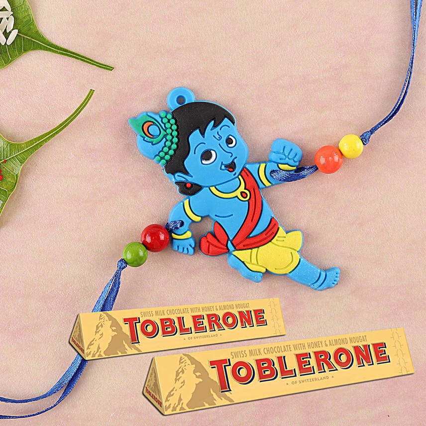 /images/pr/singapore/l/v20190802000540/little-krishna-and-toblerone-rakhi-combo_1.jpg