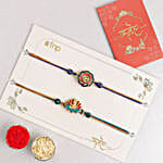 /images/pr/singapore/l/v20240717091912/vibrant-ganesh-and-om-rakhi-duo-n-rasgulla-delight_4.jpg