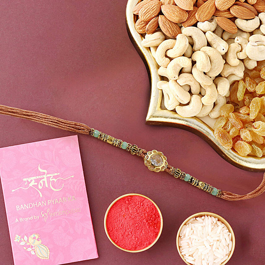 /images/pr/uae/l/v20240202185841/sneh-lustrous-stone-rakhi-dry-fruit-mix_1.jpg