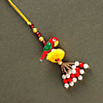 /images/pr/uae/l/v20220709125253/sneh-classic-lumba-rakhi-with-500-grams-kaju-rolls_2.jpg