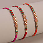 /images/pr/uae/l/v20230821174110/sneh-gleaming-pearls-rakhi-set-dry-fruit-mix_2.jpg