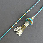 /images/pr/uae/l/v20240722180755/tranquil-teal-jhumar-bhaiya-bhabhi-pearl-rakhi-set_3.jpg