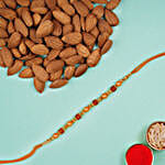 Golden Red Thread Rakhi And Almonds