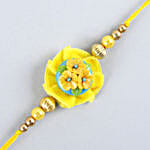 /images/pr/uk/l/v20210726161922/yellow-flower-pearl-rakhi-for-kids_3.jpg