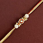/images/pr/uk/l/v20240712171814/crimson-majestic-pearl-rakhi-n-milk-cake-delight_2.jpg