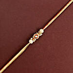 /images/pr/uk/l/v20240712171816/crimson-majestic-pearl-rakhi-n-milk-cake-delight_5.jpg