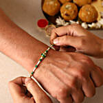 /images/pr/usa/l/v20220630195618/sneh-designer-rakhi-with-kaju-katli-ferrero-rocher_4.jpg