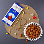 Sneh Yellow Rakhi Set With Lindt Chocolates & Almonds