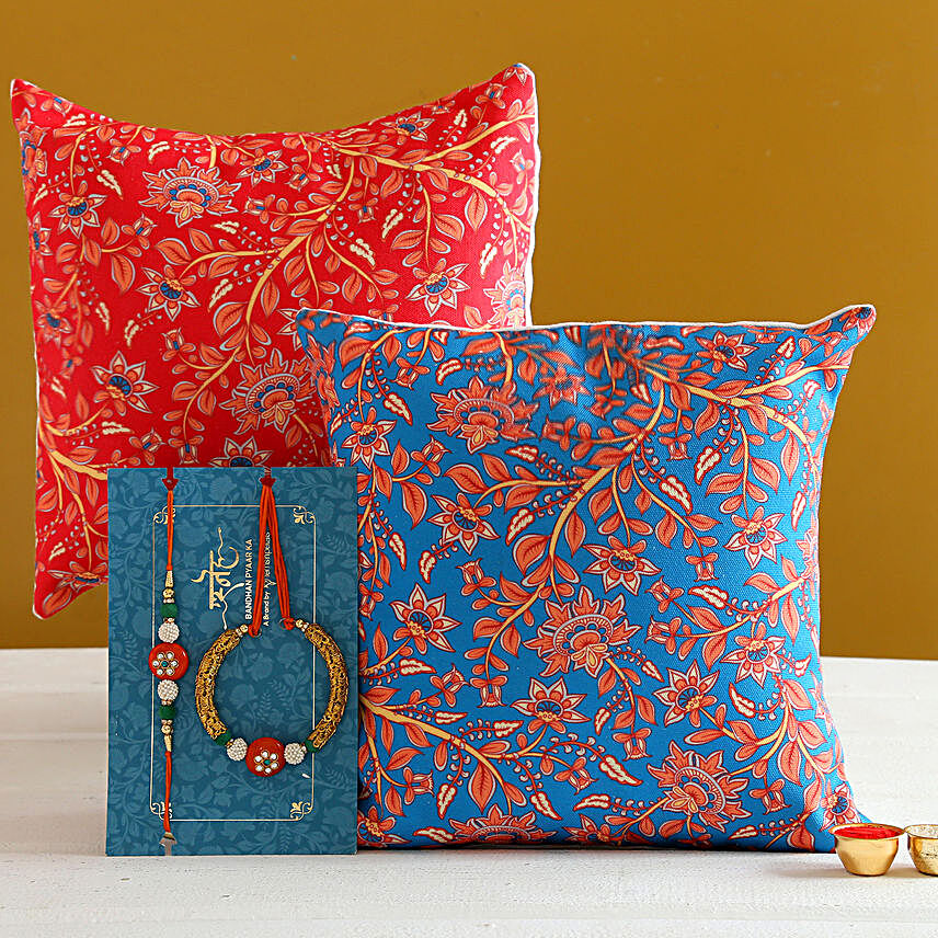 Orange Lumba Rakhi Set And 2 Floral Print Cushions:Designer Rakhi to Australia