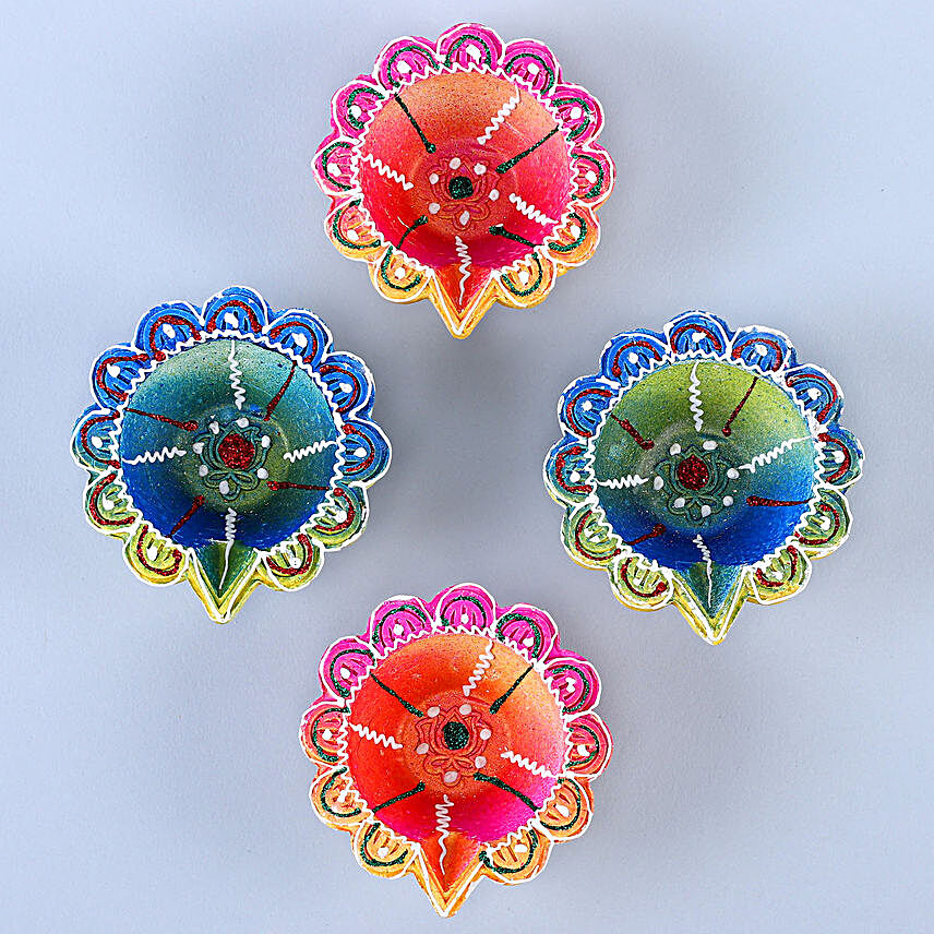 Multicoloured Handpainted Diyas With Hot Wheels And Lindt