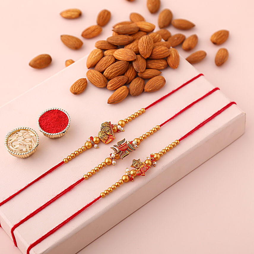 Sneh Devotional Rakhi Set & Almonds:Rakhi and Dryfruits to Australia