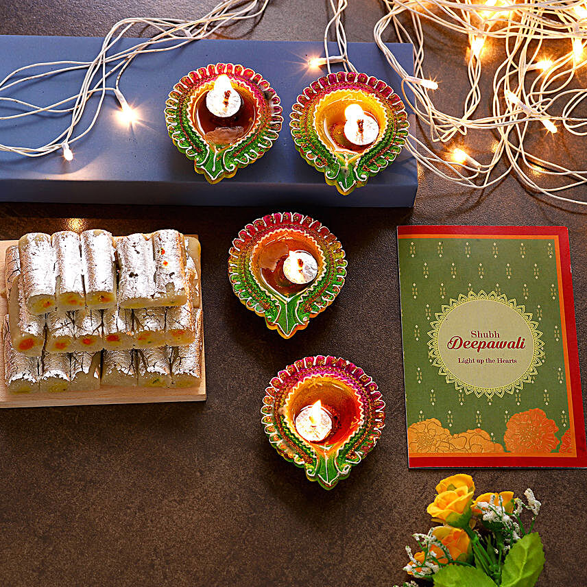 Decorative Floral Diyas With Greeting Card And Kaju Katli