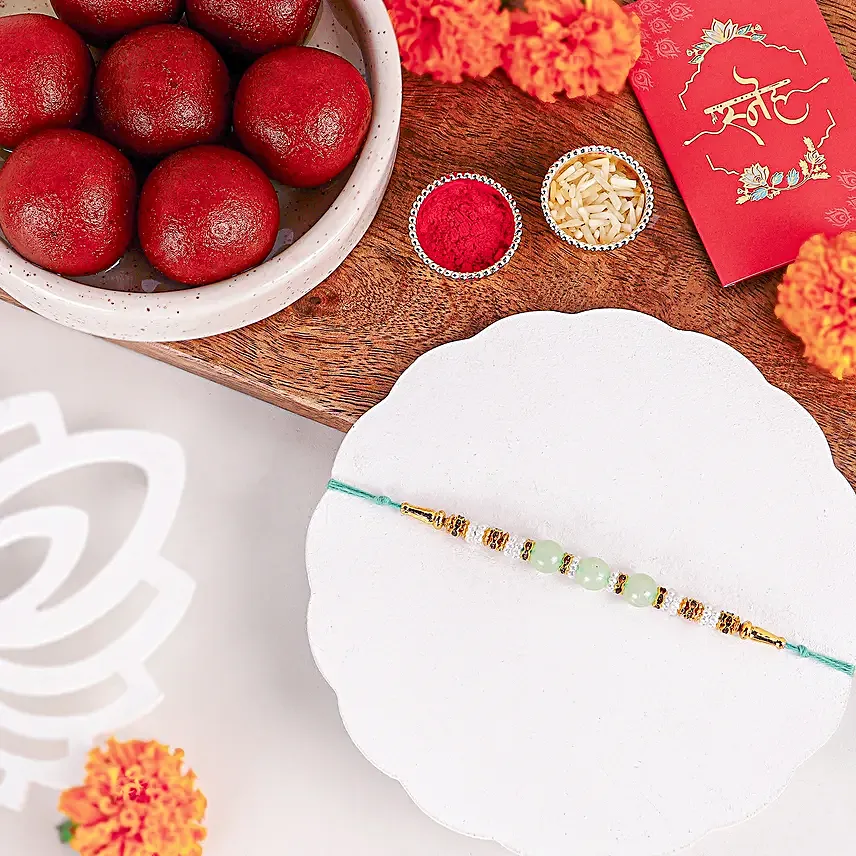 Graceful Pearl Ethnic Rakhi N Gulab Jamun Delight