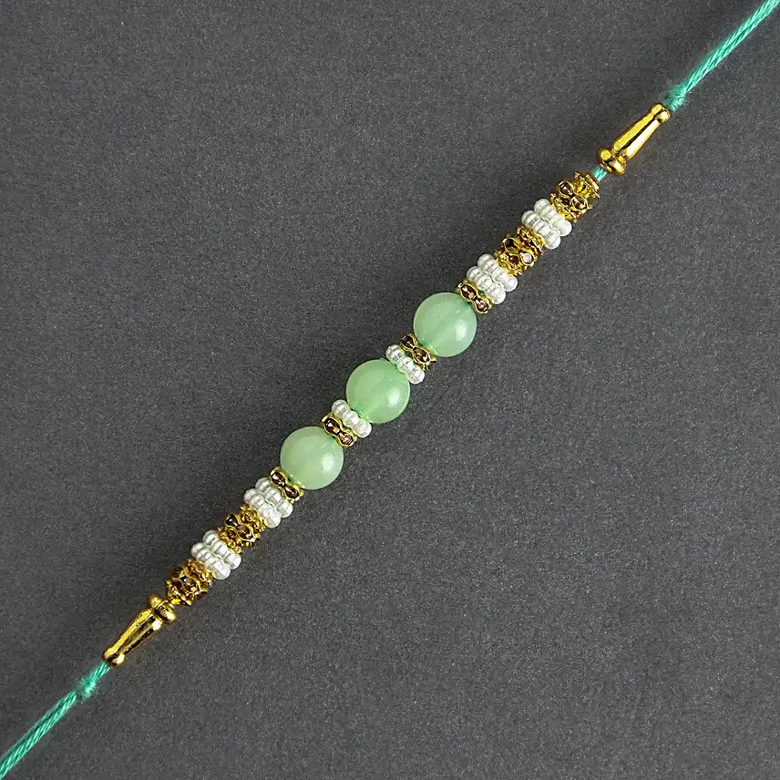 Graceful Pearl Ethnic Rakhi N Gulab Jamun Delight